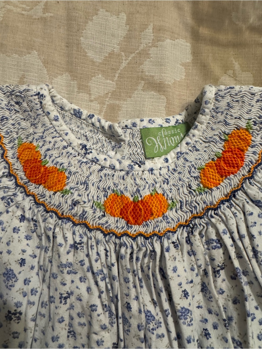 Smocked floral and pumpkin dress